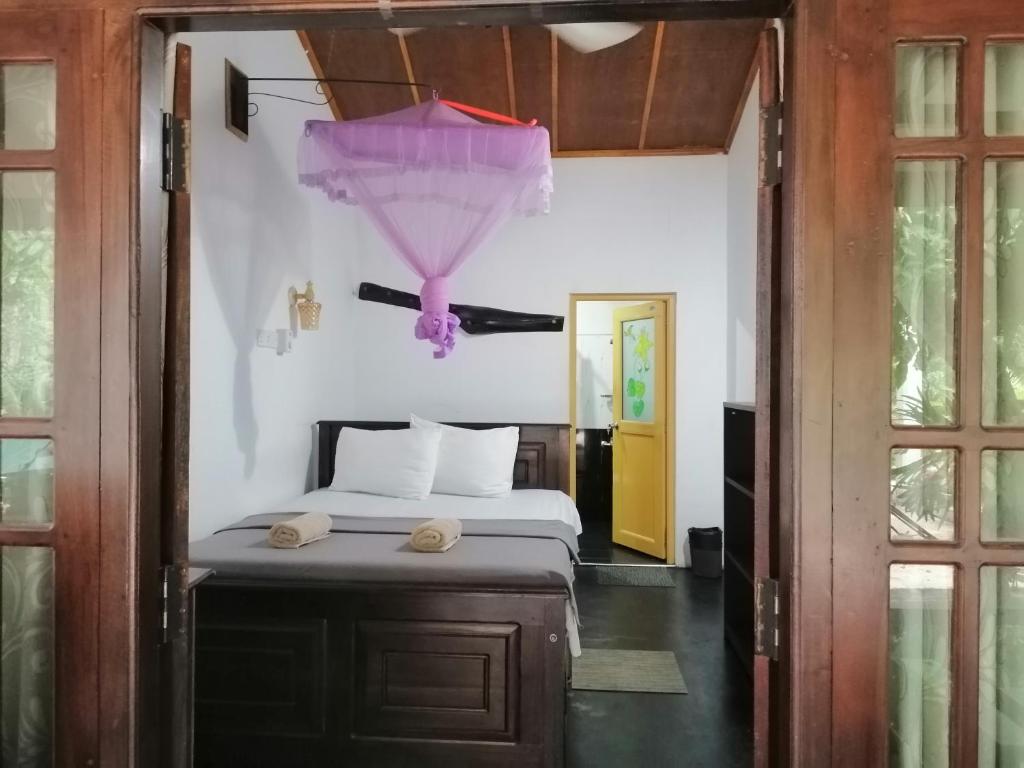 Postel nebo postele na pokoji v ubytování Villa Eden Paradise