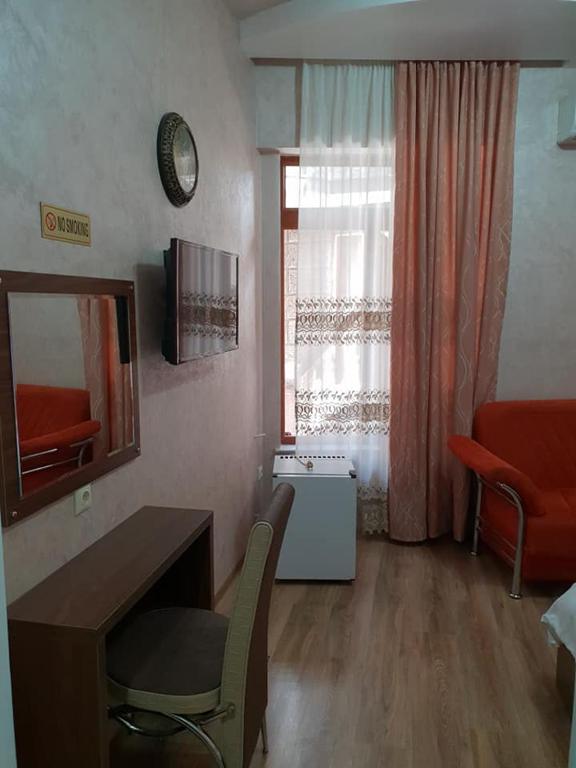 TV a/nebo společenská místnost v ubytování Hotel Old Star
