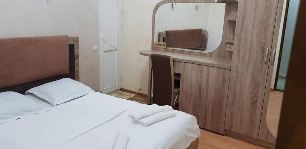 Postel nebo postele na pokoji v ubytování Hotel Old Star