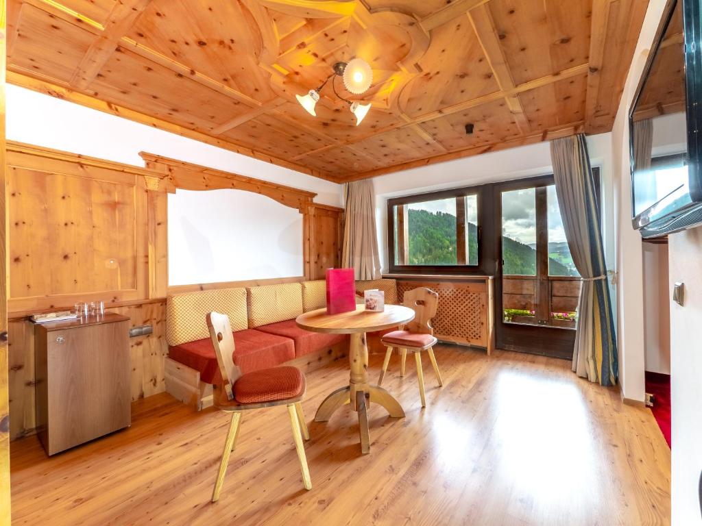 TV a/nebo společenská místnost v ubytování Hotel Alaska