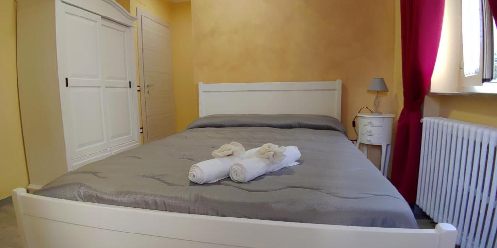 Łóżko lub łóżka w pokoju w obiekcie Residenza Manfredi