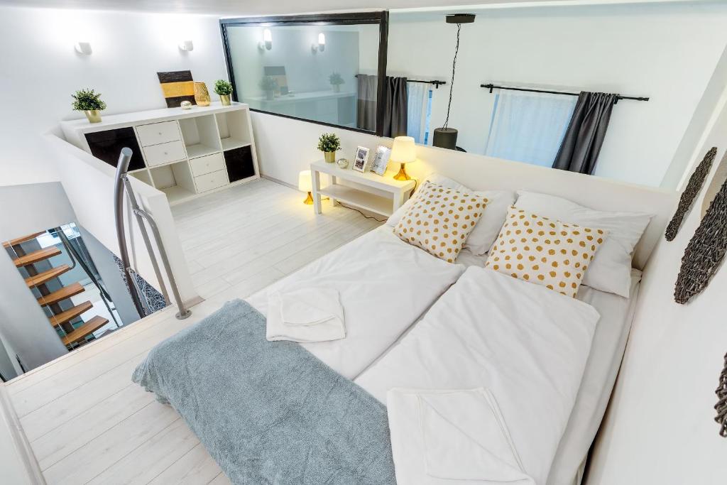 Posteľ alebo postele v izbe v ubytovaní Stylish Suite WestEnd