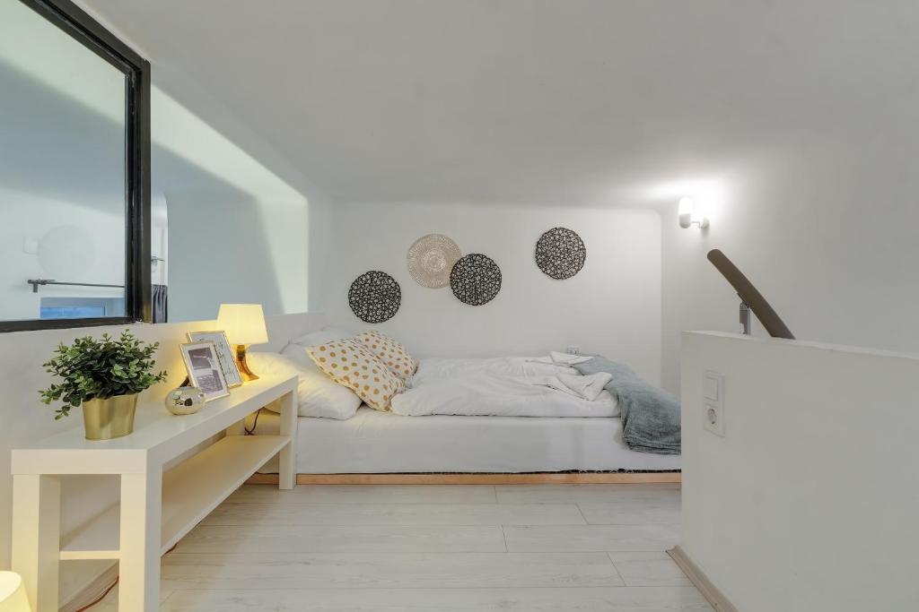 Posteľ alebo postele v izbe v ubytovaní Stylish Suite WestEnd