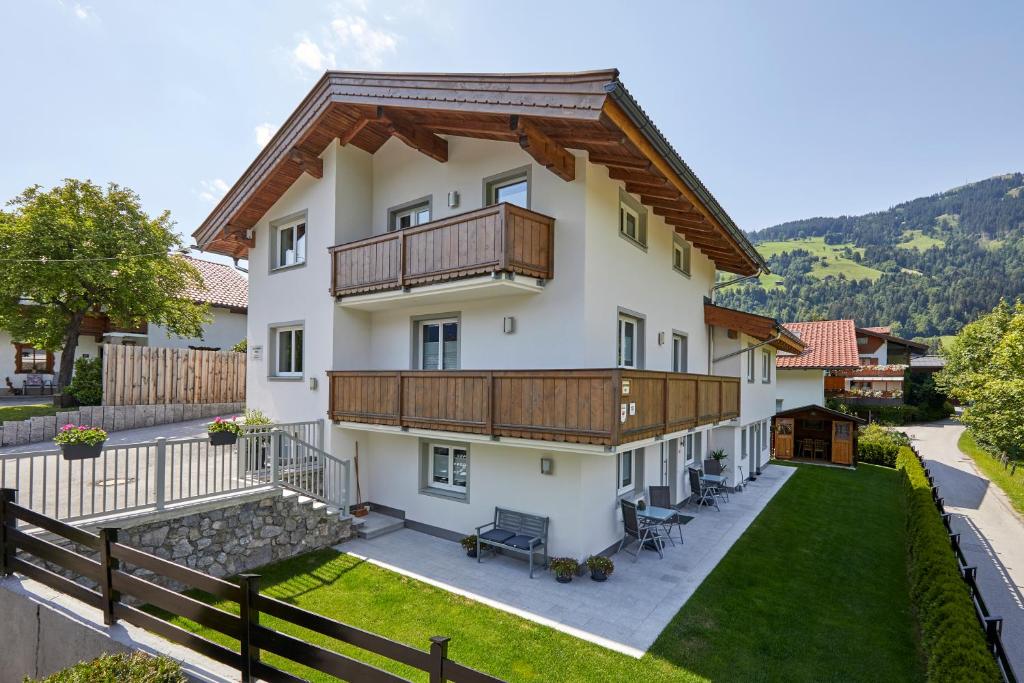 an aerial view of a house with a balcony at Appartments Weiss in Westendorf