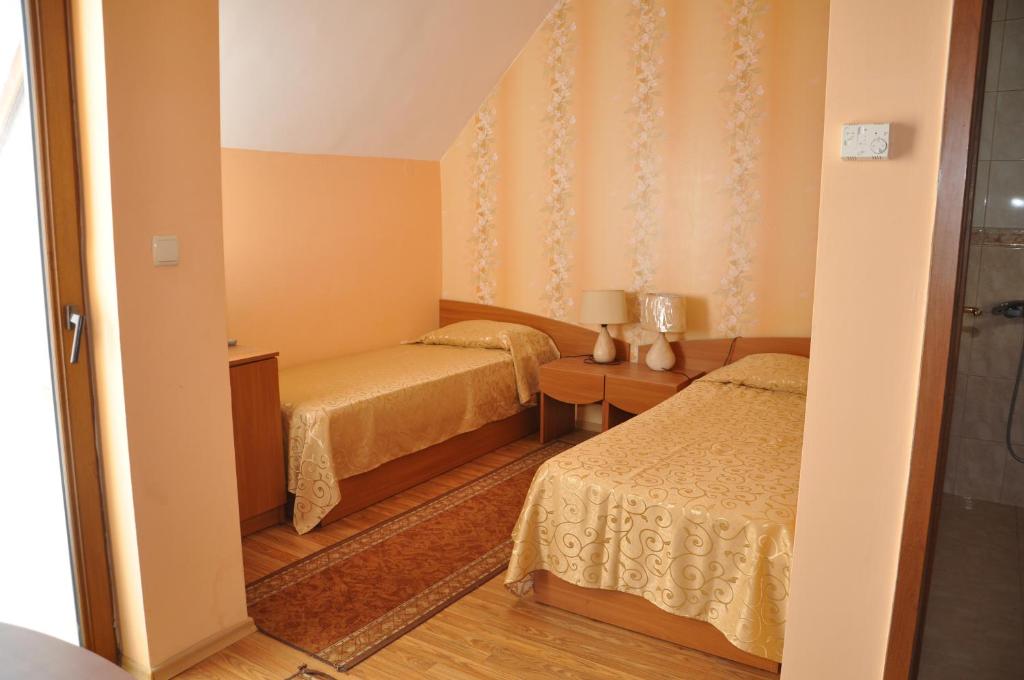 Postel nebo postele na pokoji v ubytování Guest rooms Sveti Nikola