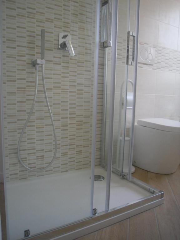 A bathroom at Lovely Little Apartment in Via Aurelia
