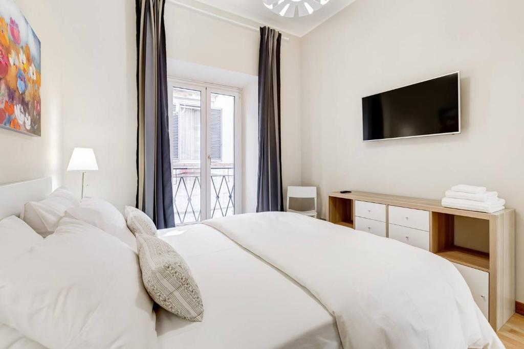 Łóżko lub łóżka w pokoju w obiekcie ELICAL Luxury Apartments