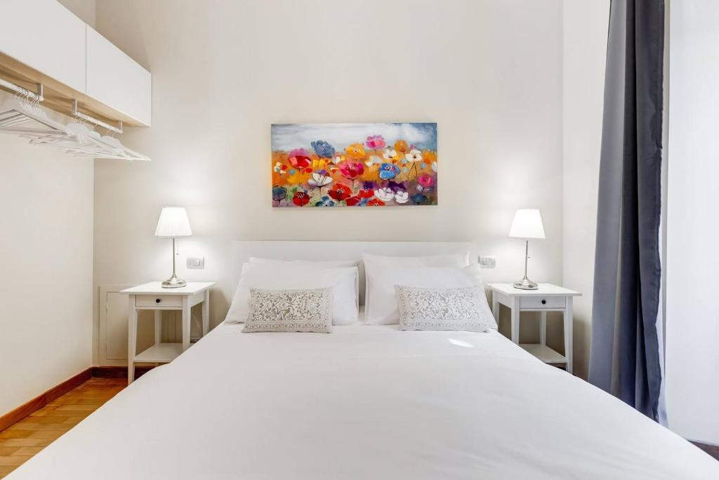 Łóżko lub łóżka w pokoju w obiekcie ELICAL Luxury Apartments