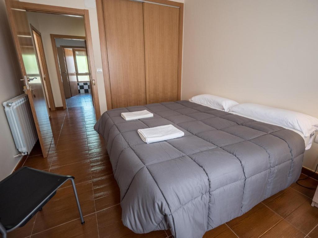 Postel nebo postele na pokoji v ubytování Albergue de Prioro