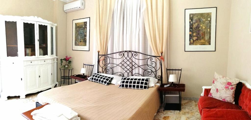 Postel nebo postele na pokoji v ubytování Residenza Carlo di Borbone