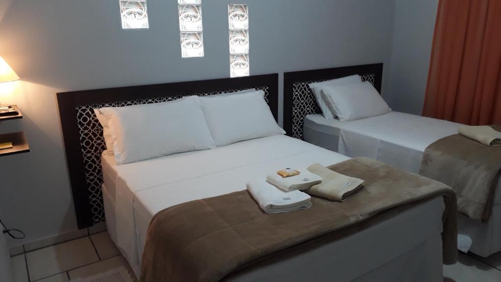 Ένα ή περισσότερα κρεβάτια σε δωμάτιο στο Familien Haus Pousada