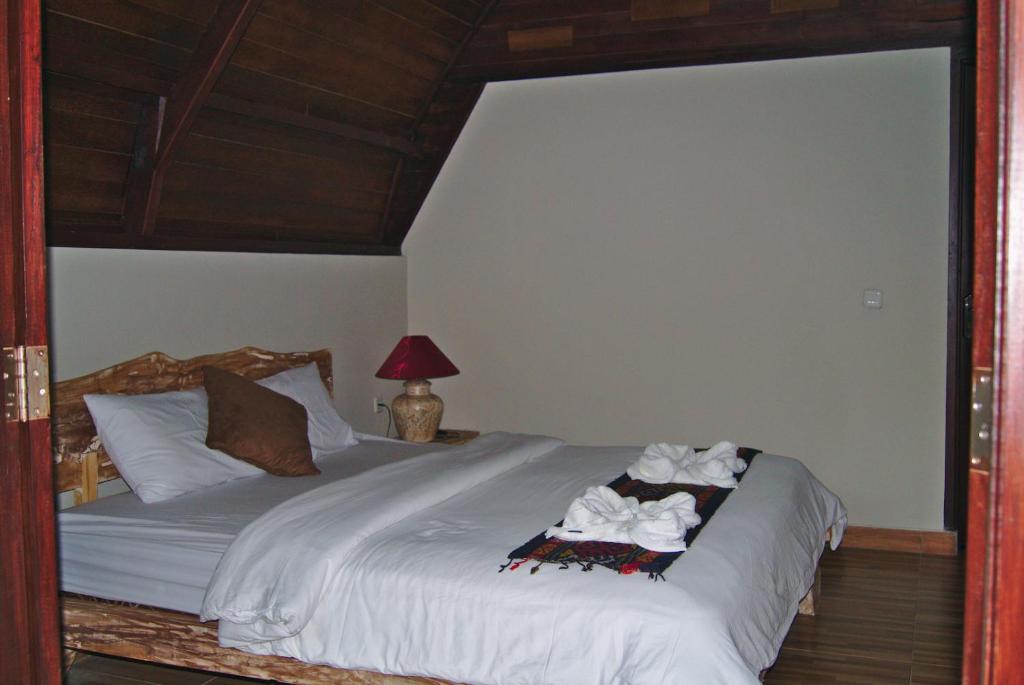 Llit o llits en una habitació de GHamed Sari