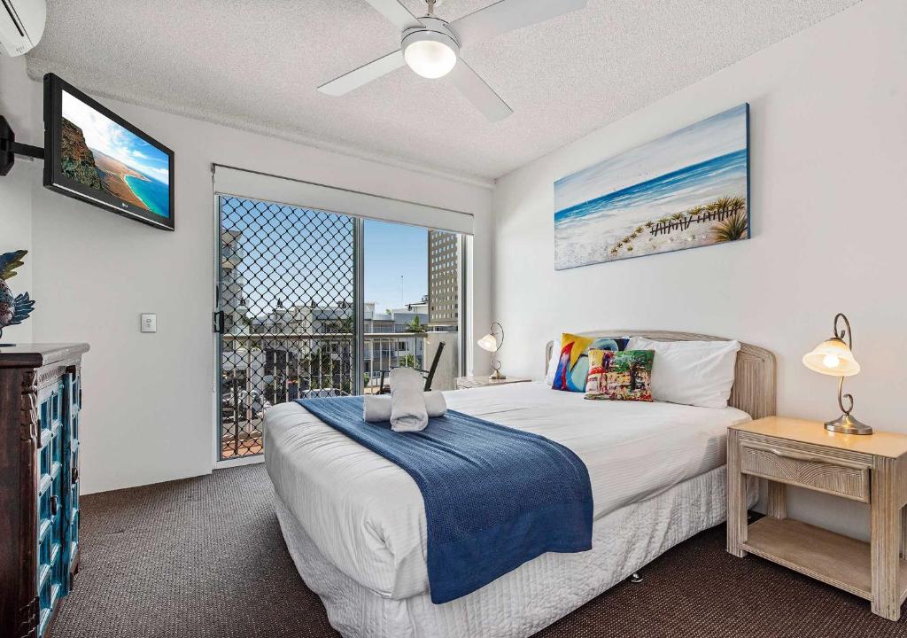 Postel nebo postele na pokoji v ubytování Sailport Mooloolaba Apartments