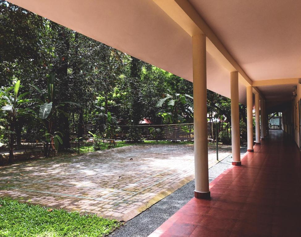 Fotografie z fotogalerie ubytování Palm Grove Service Villa v destinaci Kóčin