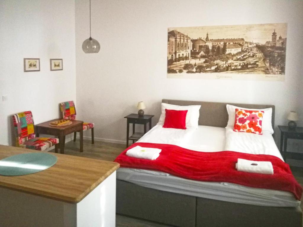 Posteľ alebo postele v izbe v ubytovaní M37 Apartman