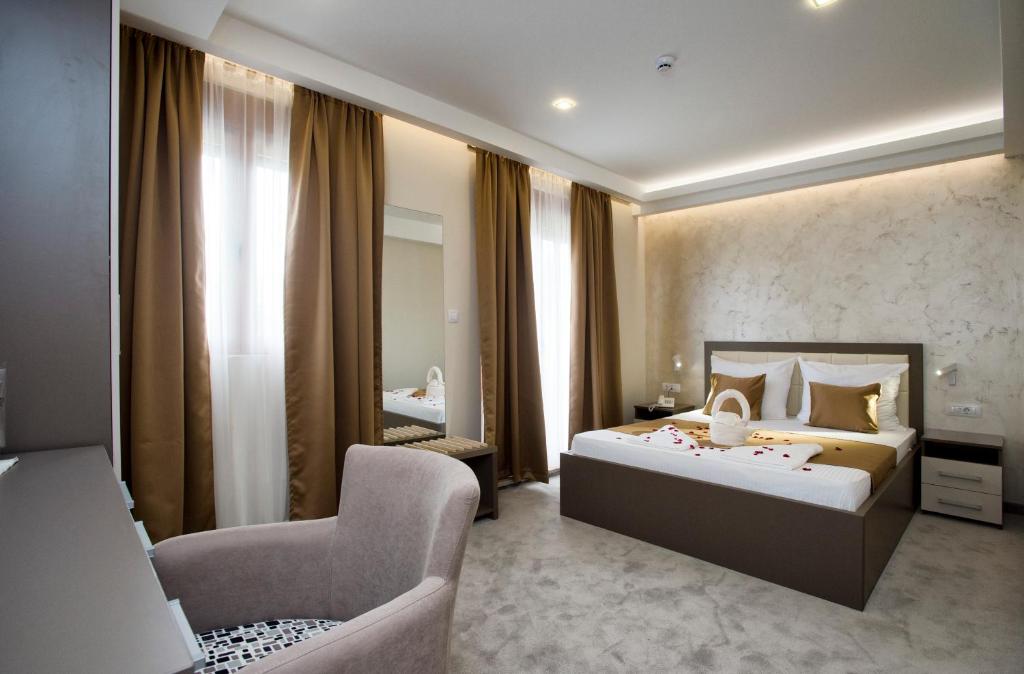 Postel nebo postele na pokoji v ubytování Hotel Fobra