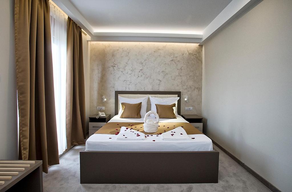 Postel nebo postele na pokoji v ubytování Hotel Fobra