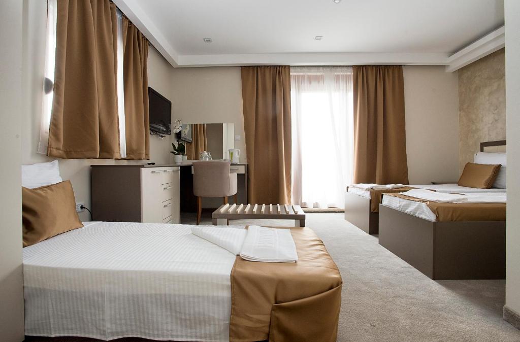 Postel nebo postele na pokoji v ubytování Hotel Fobra