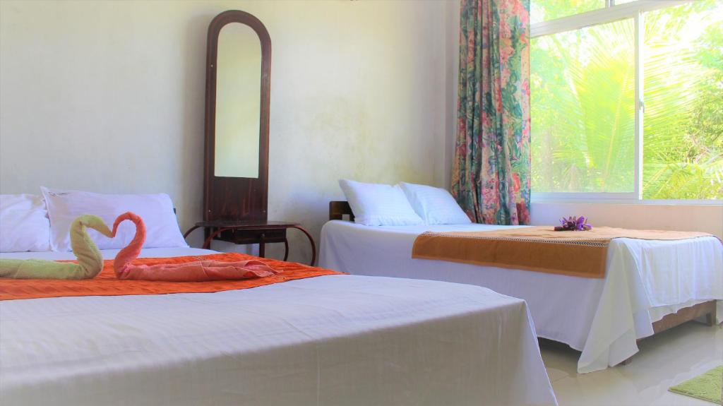 Postel nebo postele na pokoji v ubytování Samanala Resort