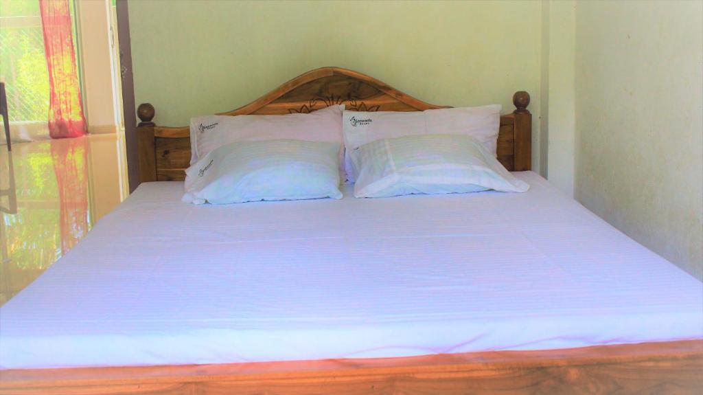 Postel nebo postele na pokoji v ubytování Samanala Resort