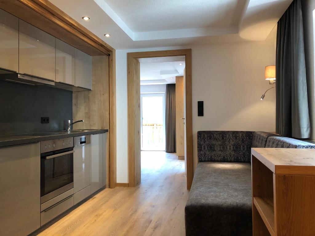 Kuchyň nebo kuchyňský kout v ubytování Hotel Garni Central - Zimmer - Studios - Apartments
