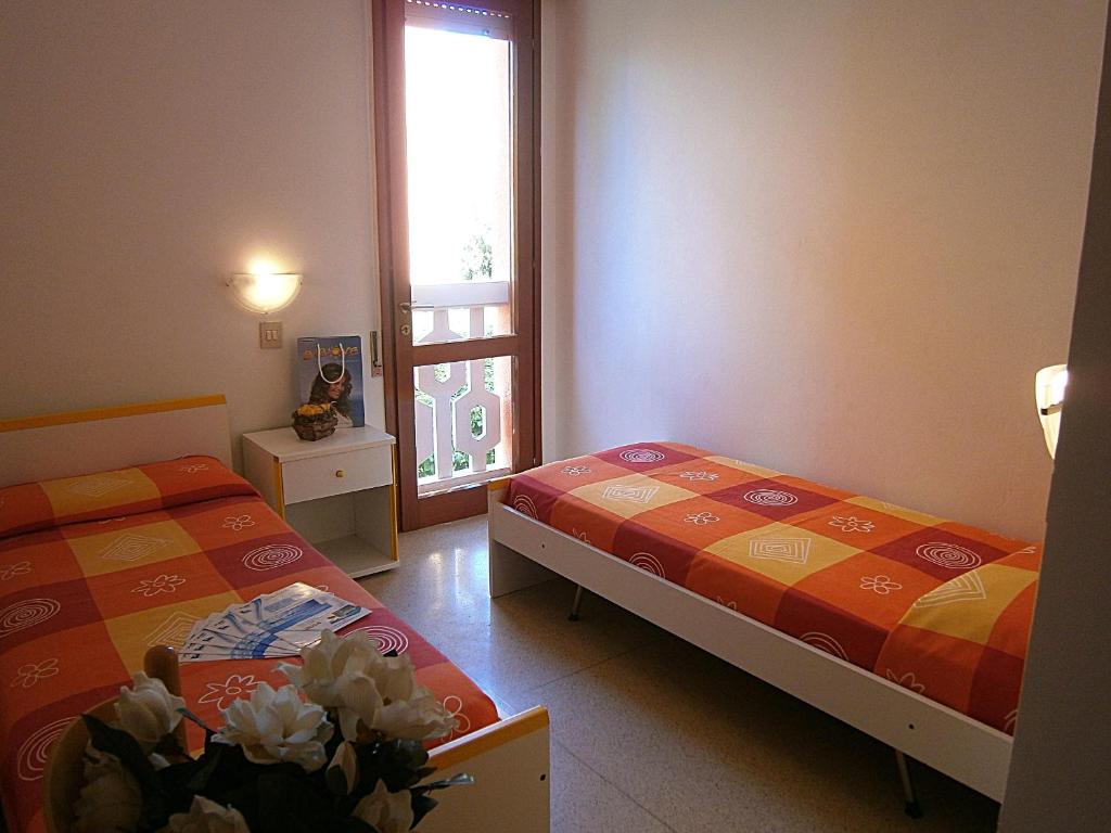 A bed or beds in a room at Castore