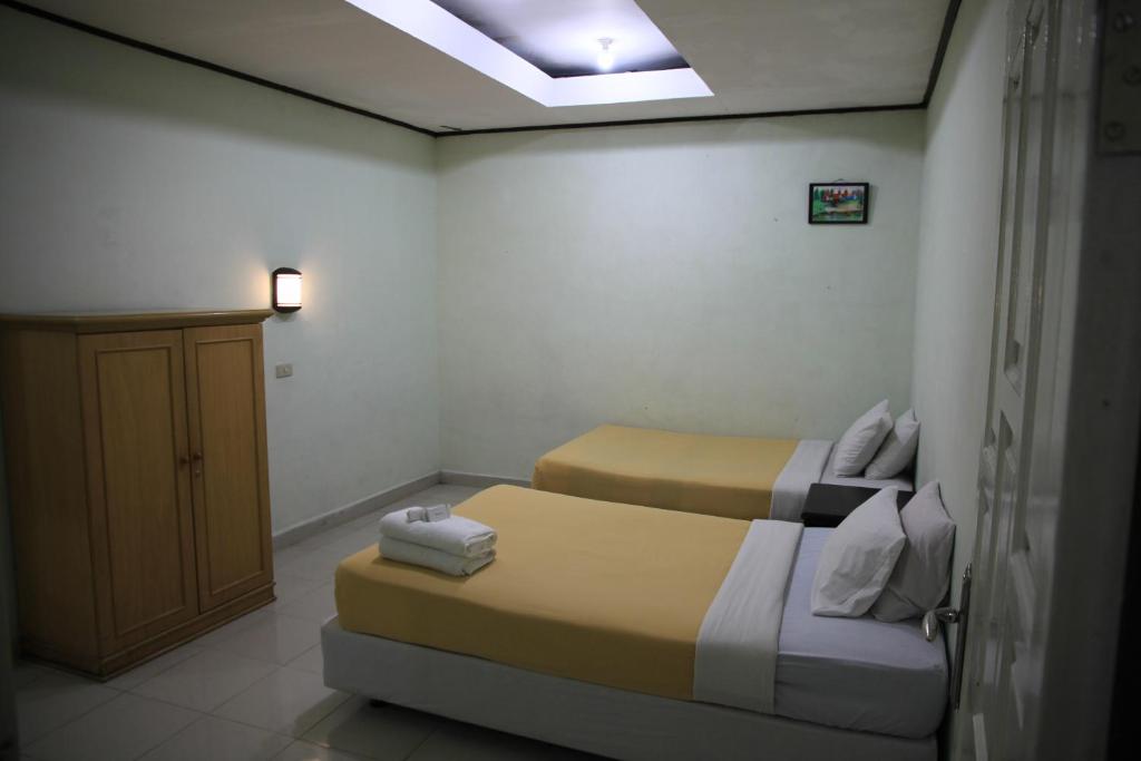 Pandu Lakeside Hotel Parapat - Deluxe Family Room