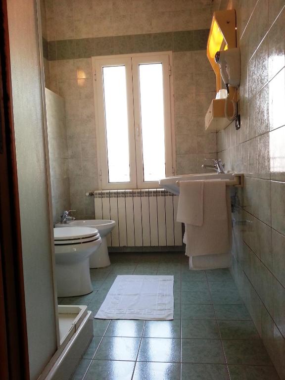 Koupelna v ubytování Hotel Clodia