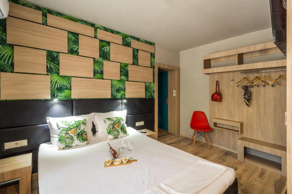 Postel nebo postele na pokoji v ubytování Hotel Allur