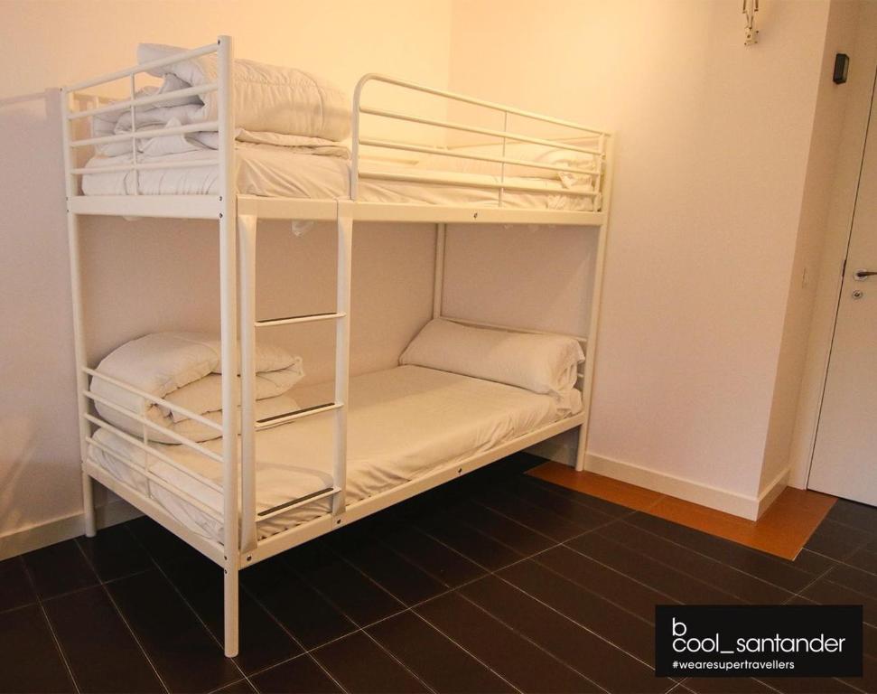 Postel nebo postele na pokoji v ubytování Enjoy Santander