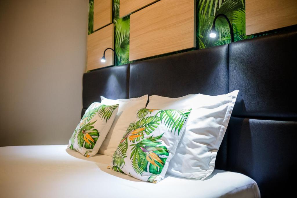 Postel nebo postele na pokoji v ubytování Hotel Allur
