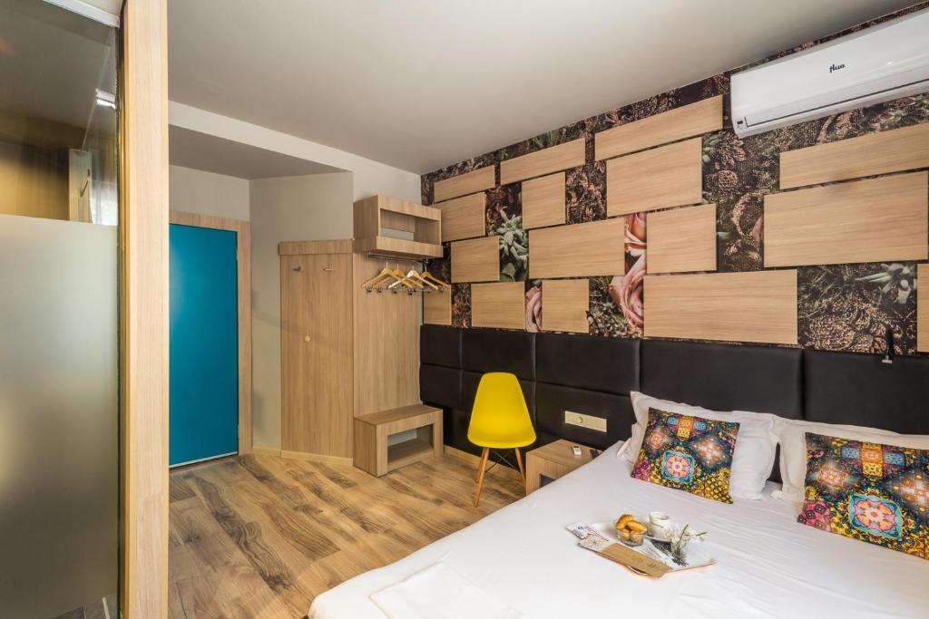 Postel nebo postele na pokoji v ubytování Hotel Allur