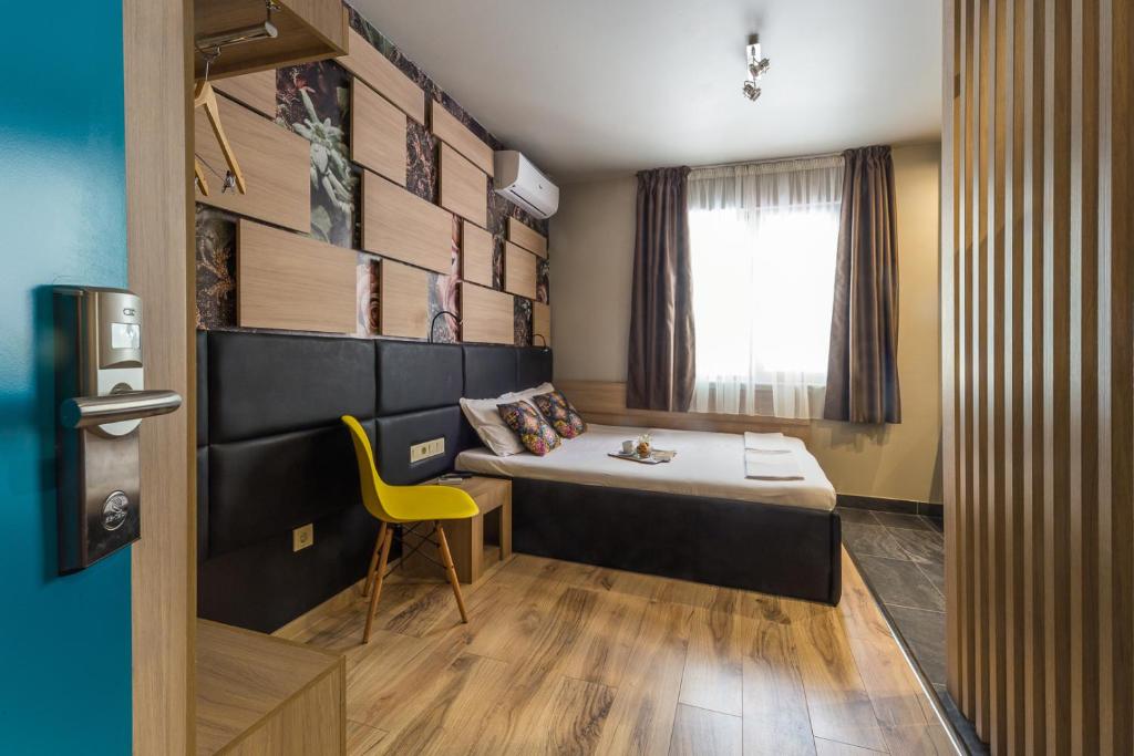 Postel nebo postele na pokoji v ubytování Hotel Allur