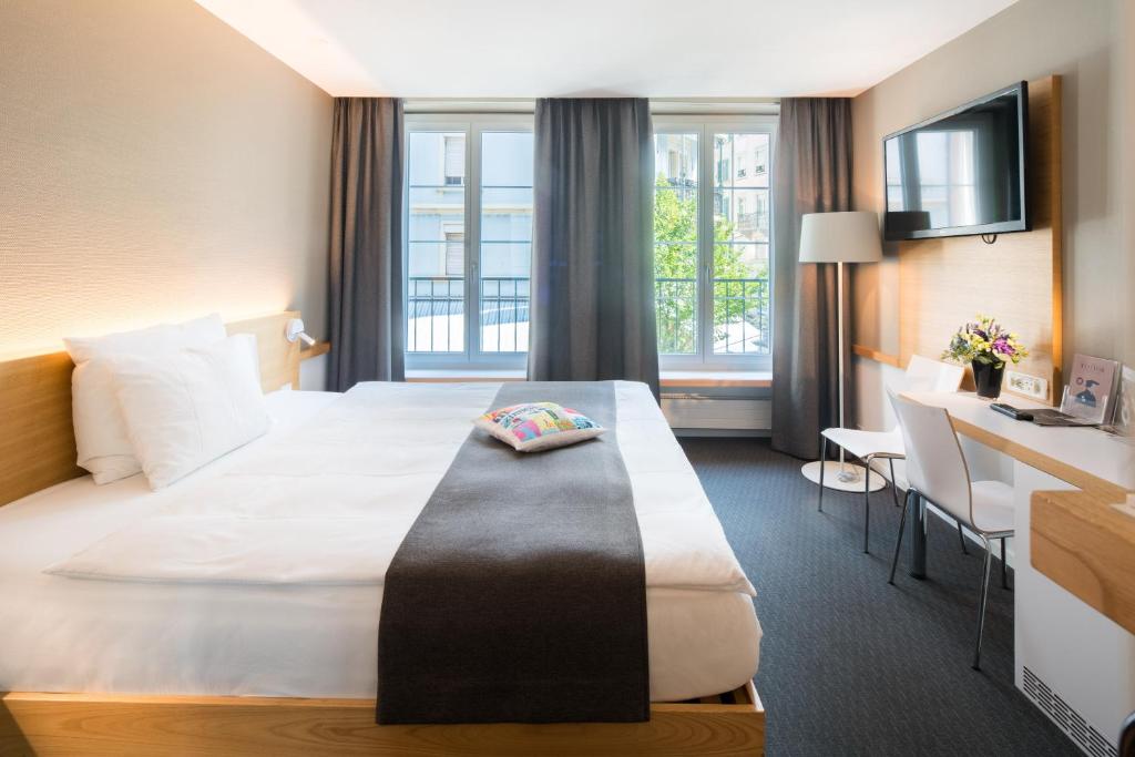Postel nebo postele na pokoji v ubytování Best Western Plus Hotel Zürcherhof