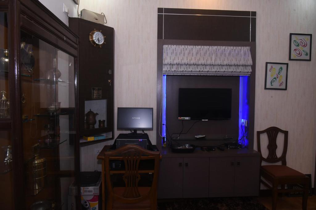 TV a/nebo společenská místnost v ubytování Square Suite