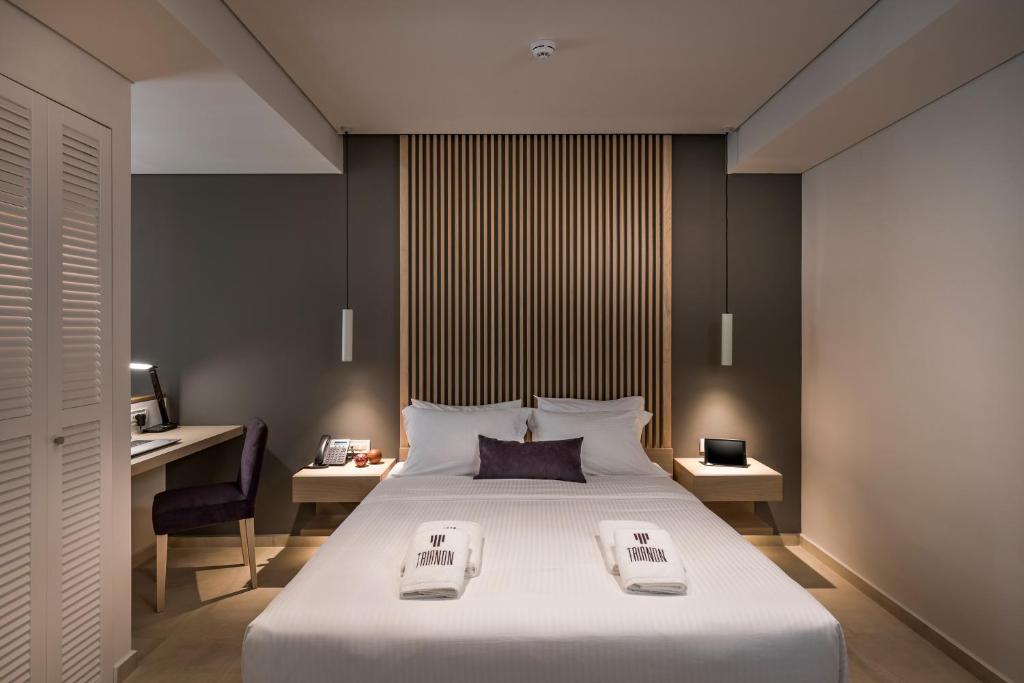 Posteľ alebo postele v izbe v ubytovaní Trianon Luxury Apartments & Suites