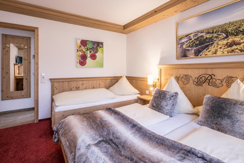 Postel nebo postele na pokoji v ubytování Hotel - Landgasthof Rebstock