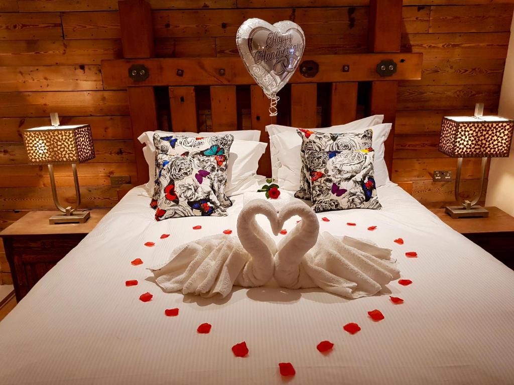 Postel nebo postele na pokoji v ubytování Grange Boutique Hotel