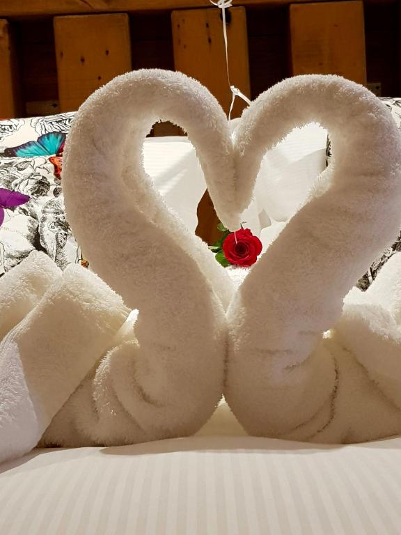 Postel nebo postele na pokoji v ubytování Grange Boutique Hotel