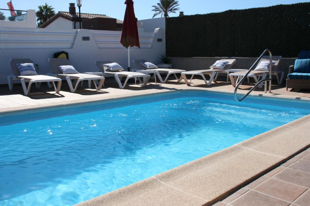 Bazén v ubytování VILLA DREAMS - VILLAS LA ESTANCIA - nebo v jeho okolí