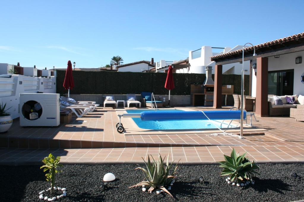 Bazén v ubytování VILLA DREAMS - VILLAS LA ESTANCIA - nebo v jeho okolí