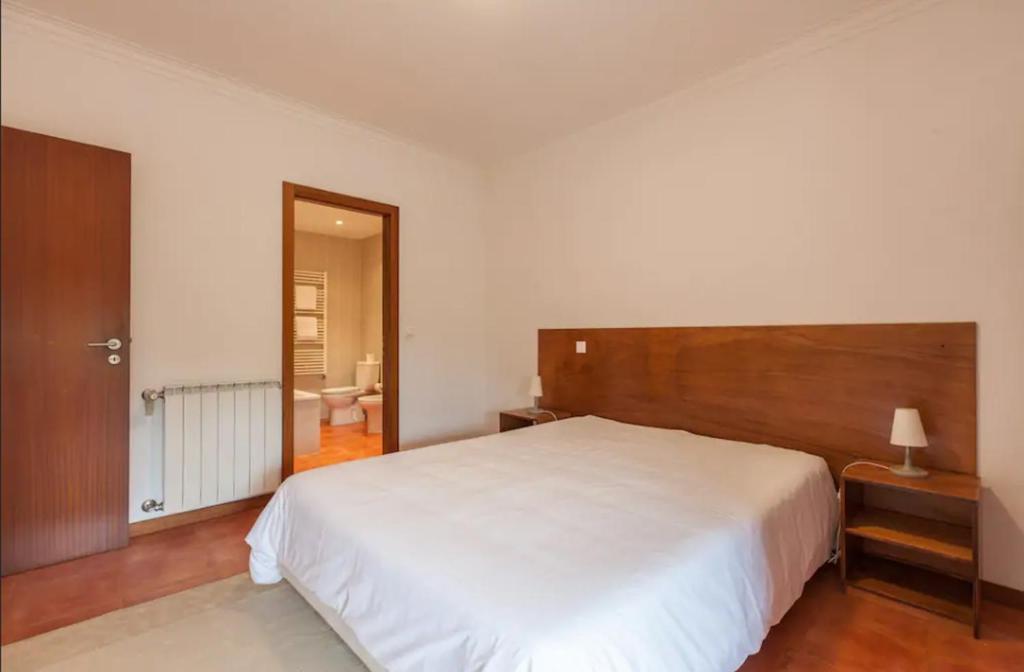Postel nebo postele na pokoji v ubytování Casa de Sapiao & Studio