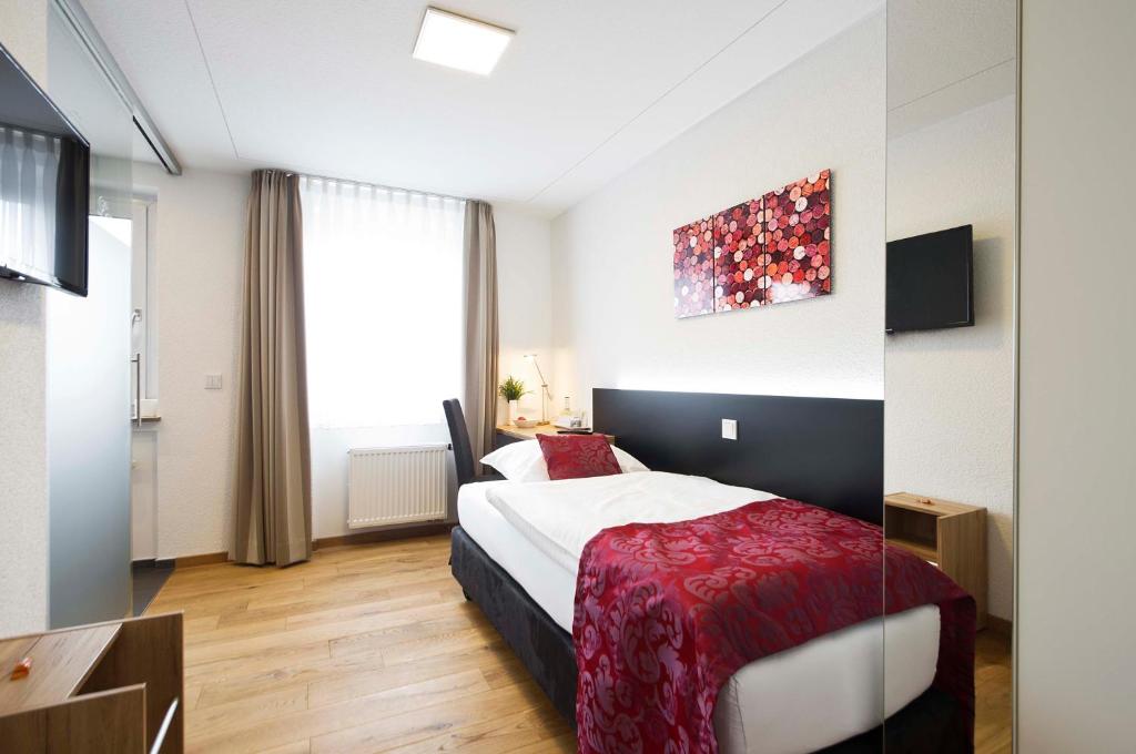 Giường trong phòng chung tại Landgasthof Lamm