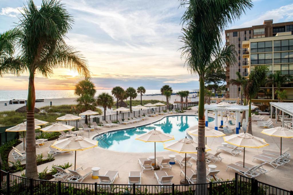 an image of a pool with umbrellas and the beach at Sirata Beach Resort in St. Pete Beach