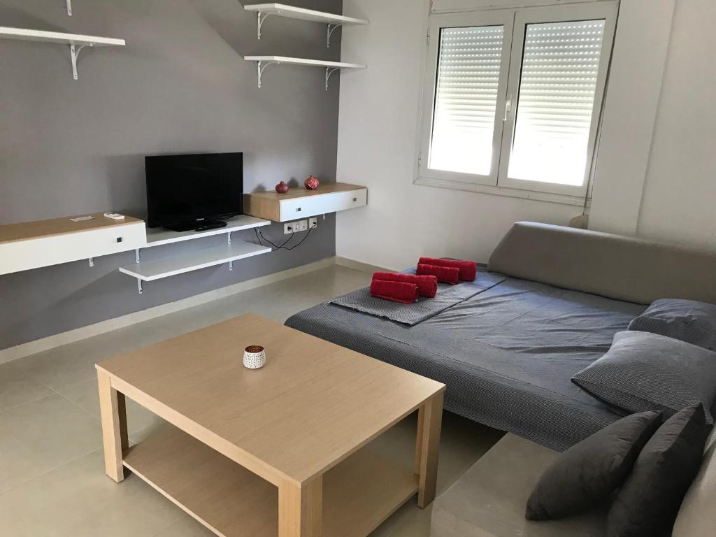 Telewizja i/lub zestaw kina domowego w obiekcie Acropolis View