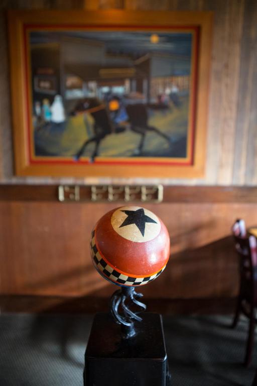 a ball with a star on it sitting on a table at McMenamins Gearhart Hotel in Gearhart
