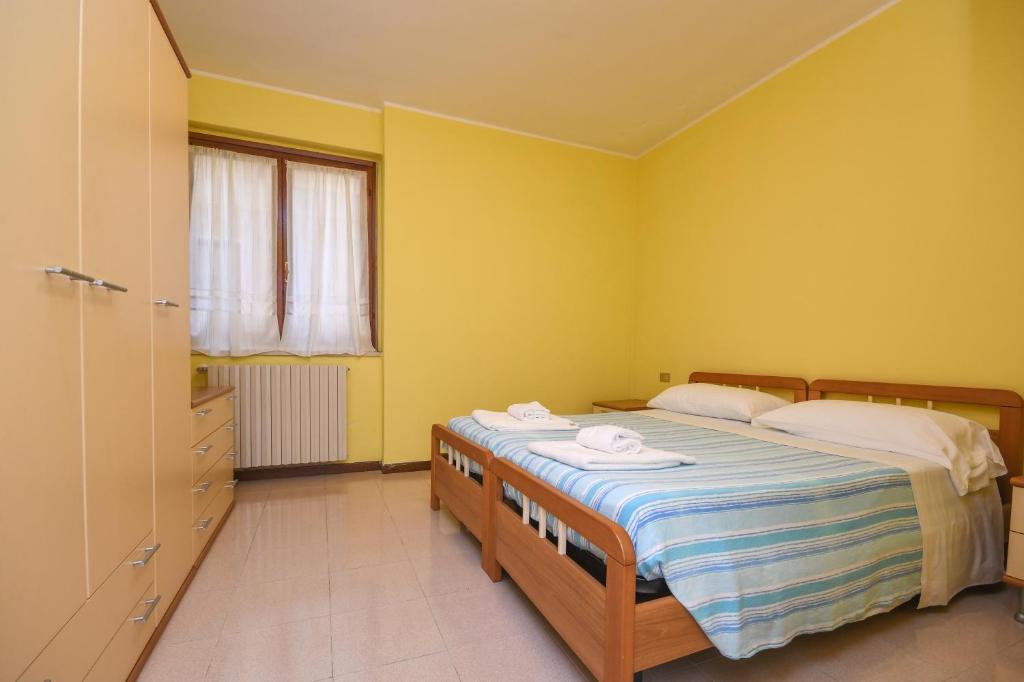 Postel nebo postele na pokoji v ubytování Residence Calap