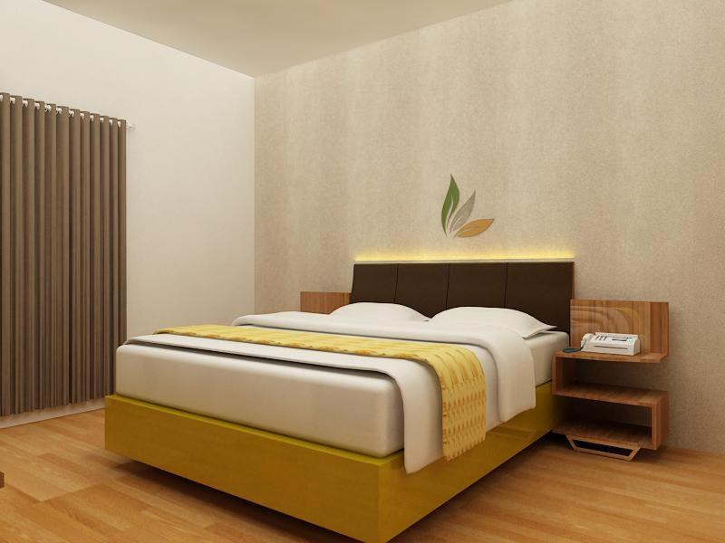 Tempat tidur dalam kamar di Hotel Salam Asri