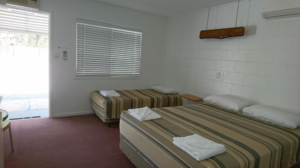 Postel nebo postele na pokoji v ubytování Bororen Motel