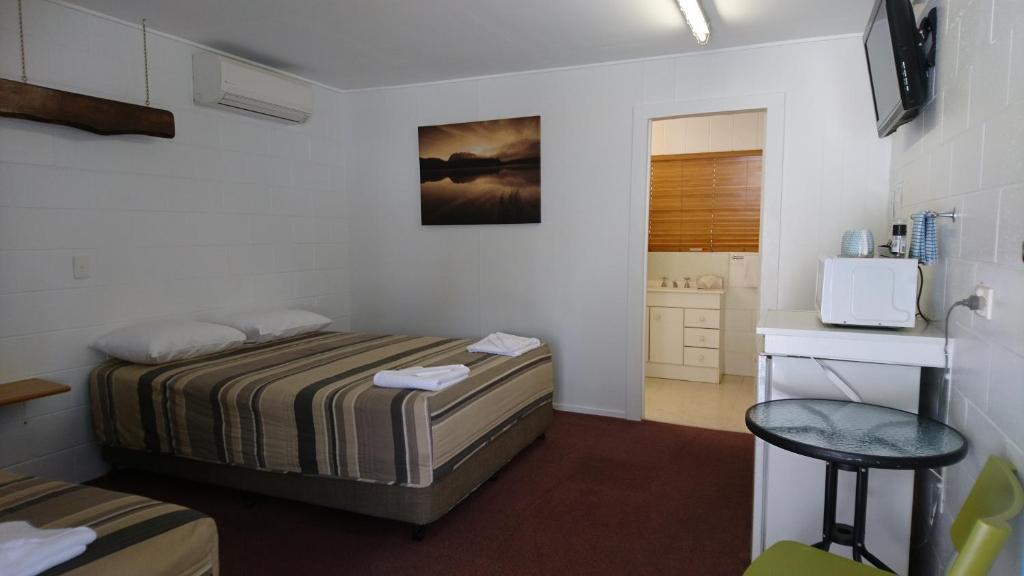 Postel nebo postele na pokoji v ubytování Bororen Motel